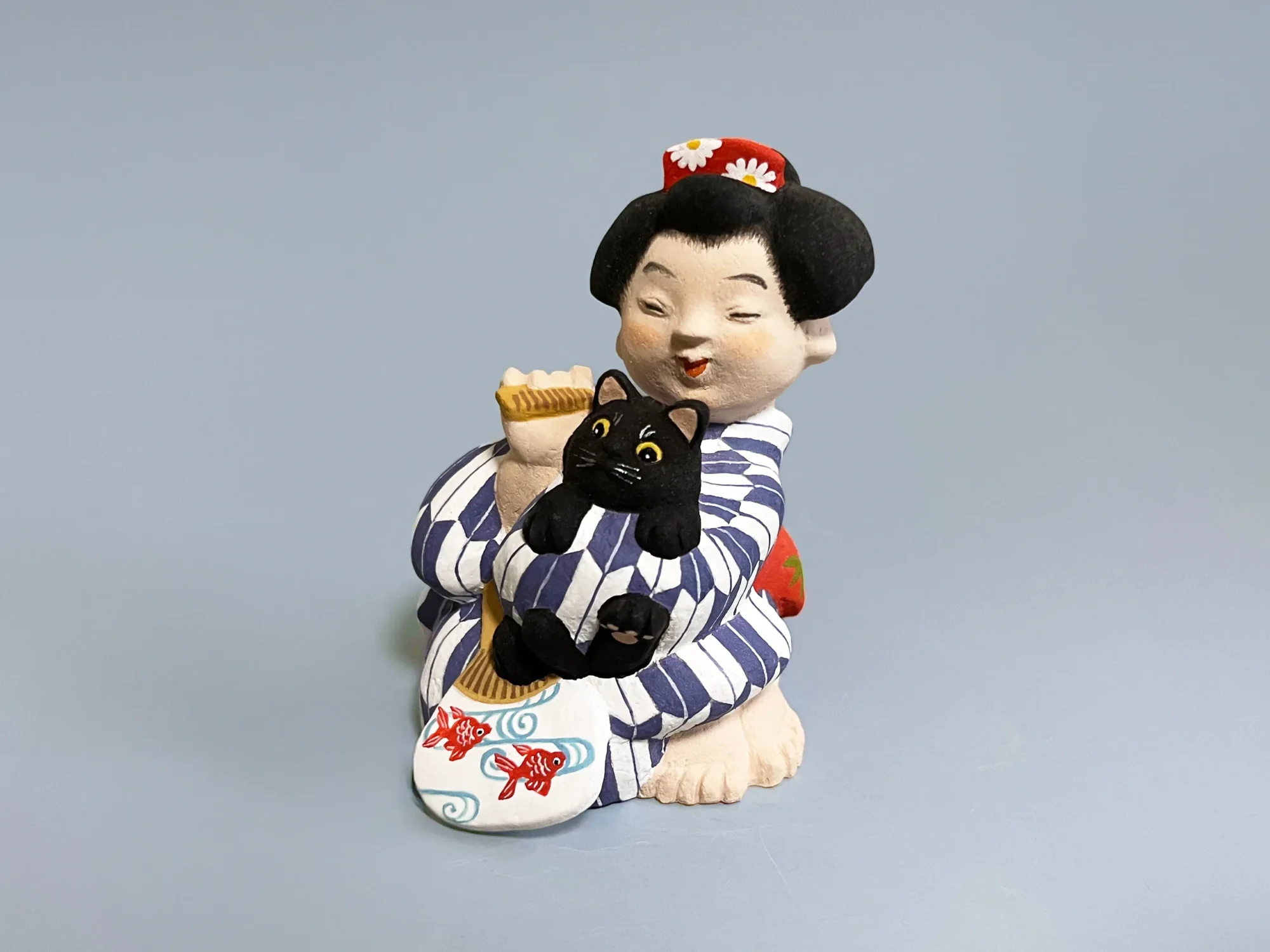 舞妓と猫・櫛